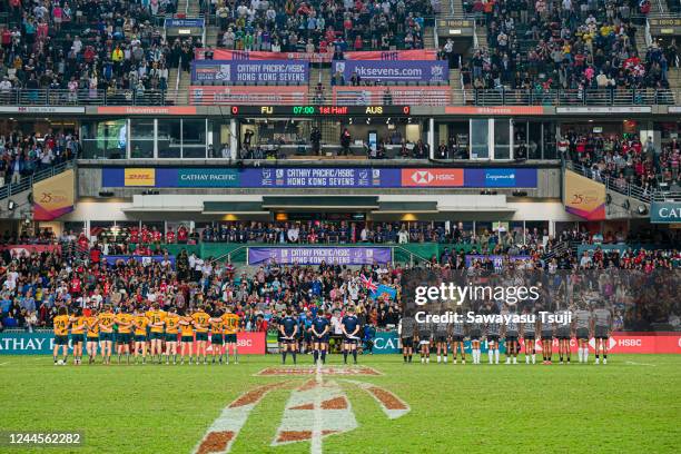 Team Australia and Fiji sing national anthem for the cup final on day three of the Cathay Pacific/HSBC Hong Kong Sevens at the Hong Kong Stadium on...