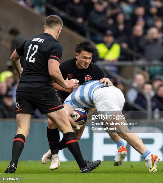 Marcus Smith of England tackles Mateo Carreras of Argentina during the Autumn International match between England and Argentina at Twickenham Stadium...