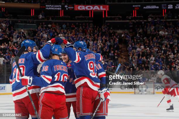 Mika Zibanejad of the New York Rangers celebrates with teammates after scoring a goal in the first period against the Detroit Red Wings at Madison...