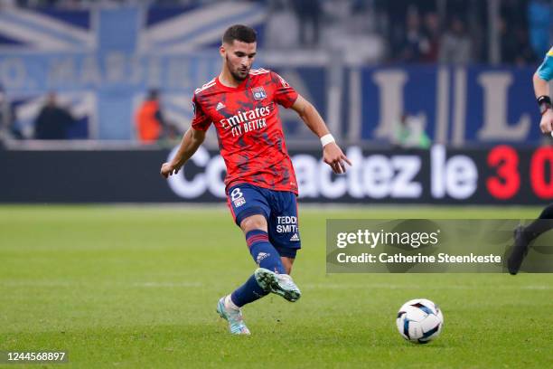 Houssem Aouar of Olympique Lyonnais passes the ball during the Ligue 1 match between Olympique de Marseille and Olympique Lyonnais at Orange...