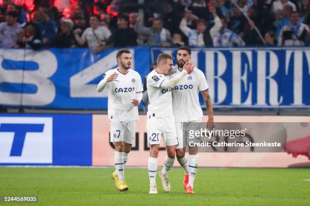 Samuel Gigot of Olympique de Marseille celebrates his goal with Valentin Rongier of Olympique de Marseille and Jonathan Clauss of Olympique de...
