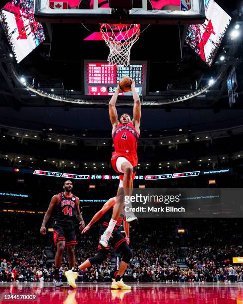 Scottie Barnes of the Toronto Raptors goes up for a slam dunk against the Chicago Bulls during the second half of their basketball game at the...