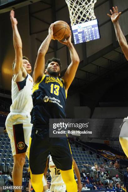 Fort Wayne, IN Bennie Boatwright of the Fort Wayne Mad Ants shoots over Peyton Watson of the Grand Rapids Gold at Memorial Coliseum in Fort Wayne,...