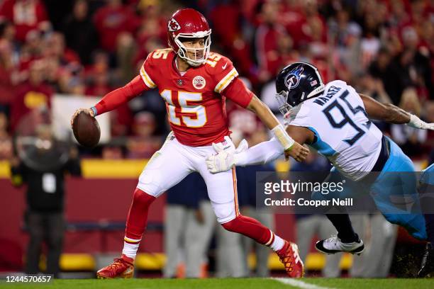 Patrick Mahomes of the Kansas City Chiefs scrambles against the Tennessee Titans during the first half at GEHA Field at Arrowhead Stadium on November...
