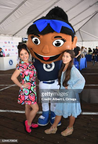 Izzie Flores and Reese Warren pose with the LA Dodger mascot at UCLA Mattel Children's Hospital's Party On The Pier held at Pacific Park at Santa...