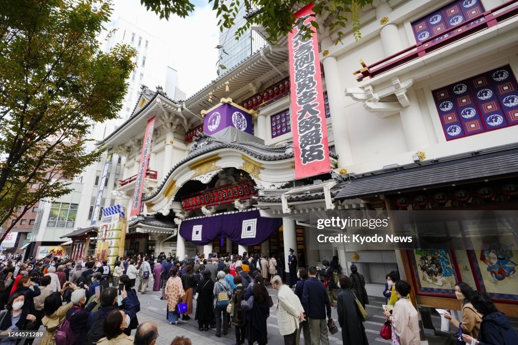 The entrance of Kabukiza Theatre in Tokyo is crowded with people on ...