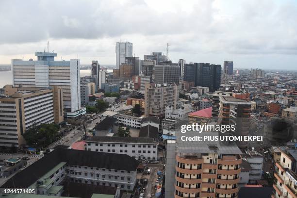 Aerial view of Lagos, Nigeria's commercial capital on October 7, 2022. - With the UN forecasting the world will soon hit 8 billion people, Lagos and...
