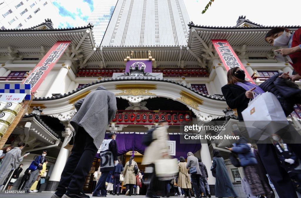 The entrance of Kabukiza Theatre in Tokyo is crowded with people on ...