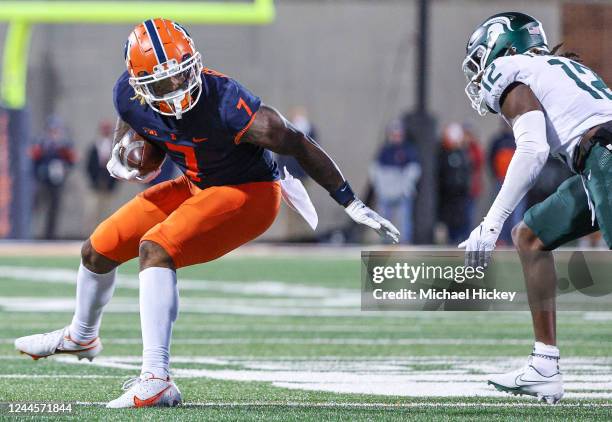 Brian Hightower of the Illinois Fighting Illini runs the ball during the game against the Michigan State Spartans at Memorial Stadium on November 5,...