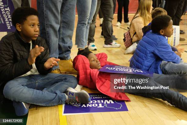 Children of Tyron Riddle of Racine, WI. From left to right: Cameron Riddle Mason Riddle and Brody Riddle listen as Wisconsin Governor Tony Evers...