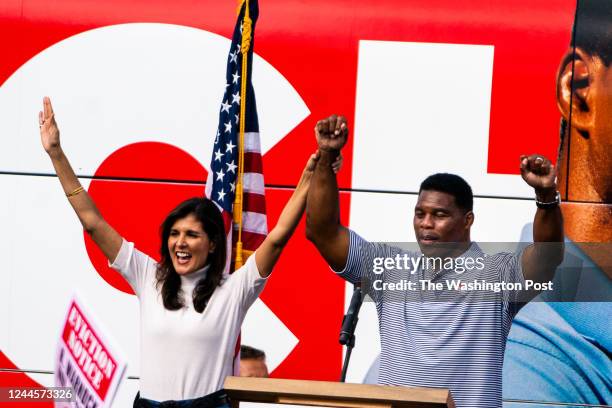 November 6, 2022: Herschel Walker and American Diplomat Nikki Haley during his Unite Georgia Bus Tour rally at Pirate Printing in Hiram, Ga on...