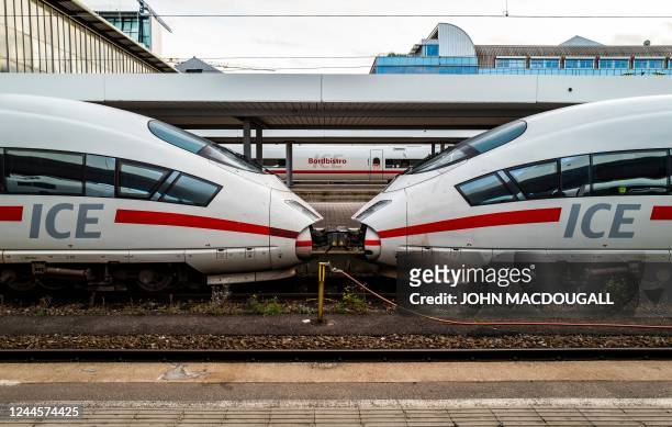 Two engines of an Inter-City Express train of German railway operator Deutsche Bahn are seen at a platform of Munich's main railway station on...