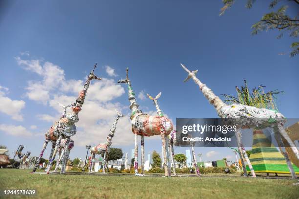 Animal statues made of recycled plastic waste are seen at the 27th session of the Conference of the Parties to the United Nations Framework...