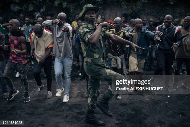 Congolese soldier leads a session to enroll new recruits into the army to go to the front against the M23 rebellion, in Goma, on November 7, 2022. -...