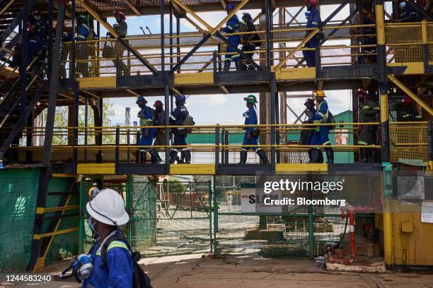 Workers make their way to the Henderson shaft elevator at the Mufulira mine, operated by Mopani Copper Mines Plc, in Mufulira, Zambia, on Friday, May...