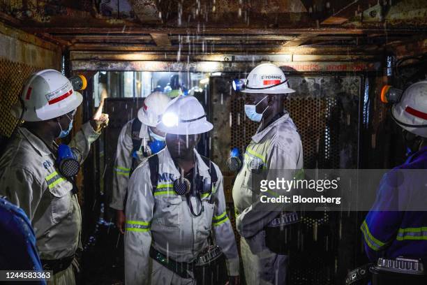 Water drips onto workers riding the Henderson shaft elevator underground at the Mufulira mine, operated by Mopani Copper Mines Plc, in Mufulira,...