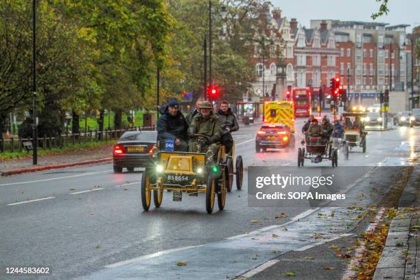 Georges Richard leads other veteran cars as they participate in the Veteran Car as it rains during the run course at Clapham Common. More than 350...