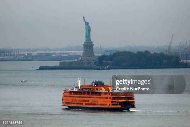 View on Staten Island Ferry on East River and the Statue of Liberty in New York, United States, on October 24, 2022.