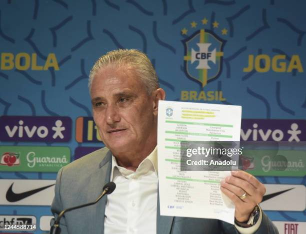 Head coach of Brazil Tite shows the list with the players during a press conference to announce the squad for the upcoming Qatar 2022 World Cup at...