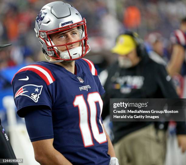 October 24: Mac Jones of the New England Patriots on the sidelines during the second half of the NFL game against the Chicago Bears at Gillette...