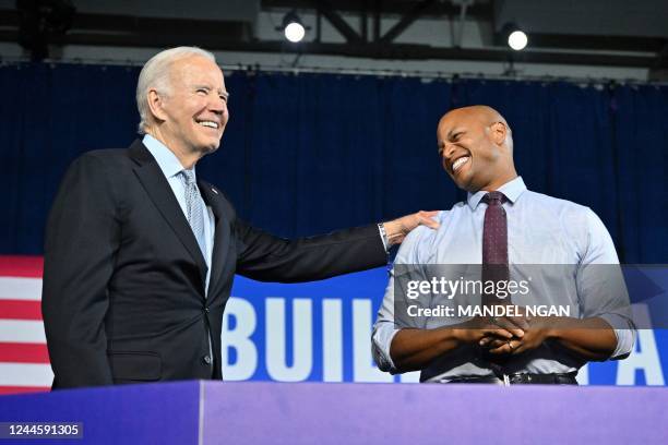 President Joe Biden greets gubernatorial candidate Wes Moore during a rally on the eve of the US midterm elections, at Bowie State University in...