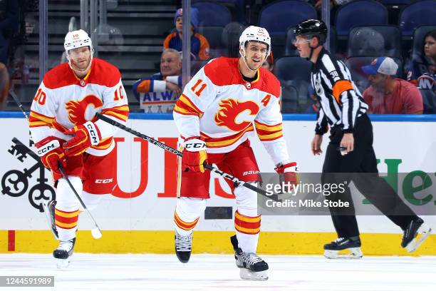 Mikael Backlund of the Calgary Flames reacts after scoring a goal against the New York Islanders during the first period at UBS Arena on November 07,...