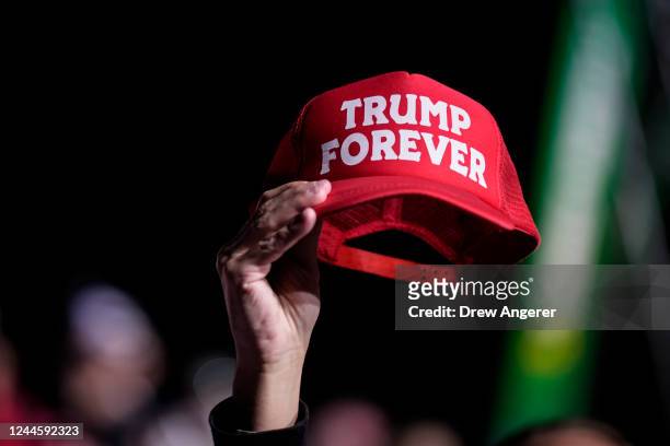Supporters of former U.S. President Donald Trump await his arrival for a rally at the Dayton International Airport on November 7, 2022 in Vandalia,...