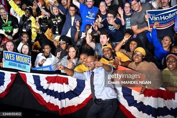 Gubernatorial candidate Wes Moore poses for pictures with supporters during a rally with US President Joe Biden and US First Lady Jill Biden on the...