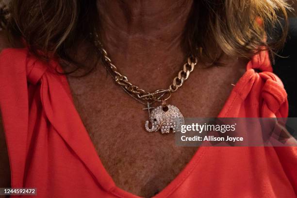 Woman wears an elephant necklace at a rally for U.S. Senate nominee Rep. Ted Budd at the North Carolina Republican Party Headquarters on November 7,...