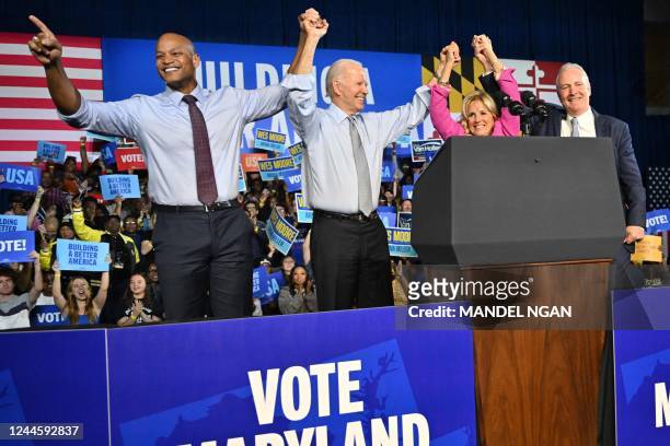 Gubernatorial candidate Wes Moore, US President Joe Biden, US First Lady Jill Biden and US Senator Chris Van Hollen acknowledge the crowd during a...