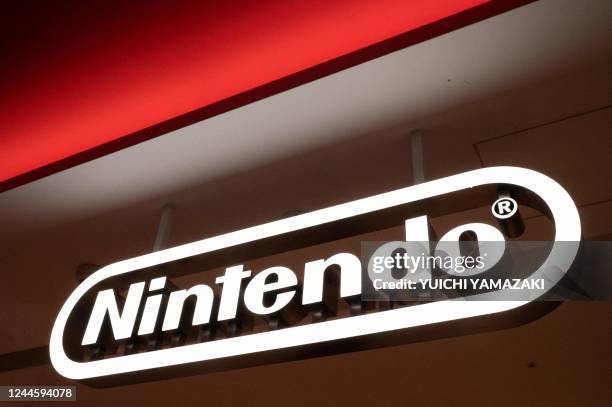 This picture taken on November 7, 2022 shows the logo of game giant Nintendo at a store in Tokyo. - Nintendo were expected to announce their second...