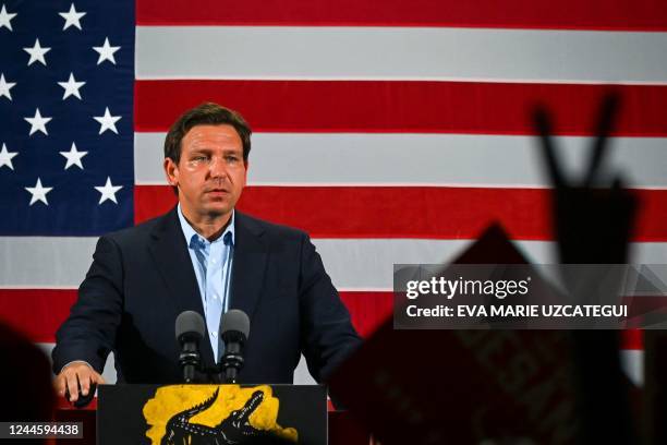 Florida Governor Ron DeSantis speaks during a "Unite and Win" event as he campaigns for re-electionon the eve of the US midterm elections, at Hialeah...