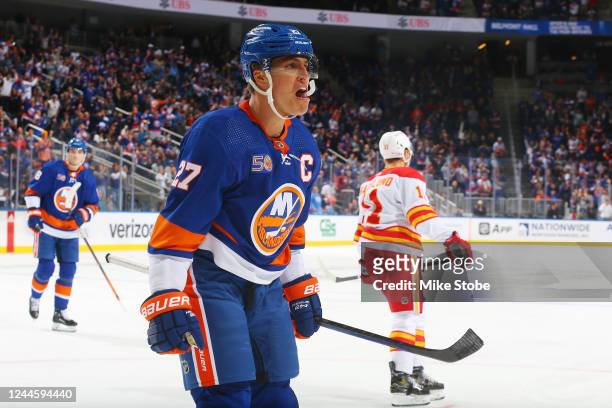 Anders Lee of the New York Islanders celebrates after scoring a goal against the Calgary Flames during the third period at UBS Arena on November 07,...