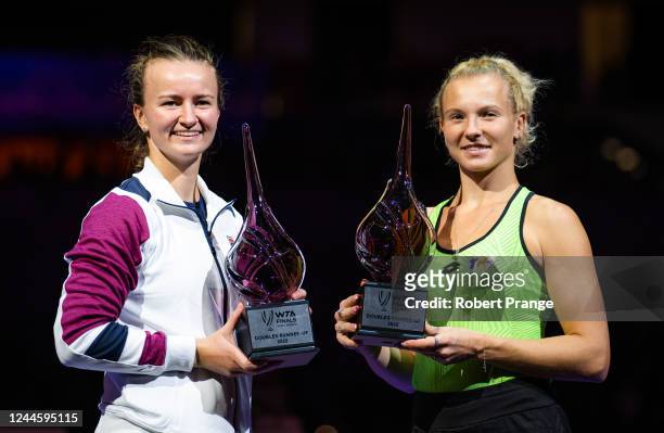 Barbora Krejcikova of the Czech Republic and Katerina Siniakova of the Czech Republic pose with their runner-up trophies after losing to Elise...
