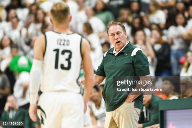 Michigan State Spartans head coach Tom Izzo instructs his son, guard Steven Izzo during a college basketball game between the Michigan State Spartans...