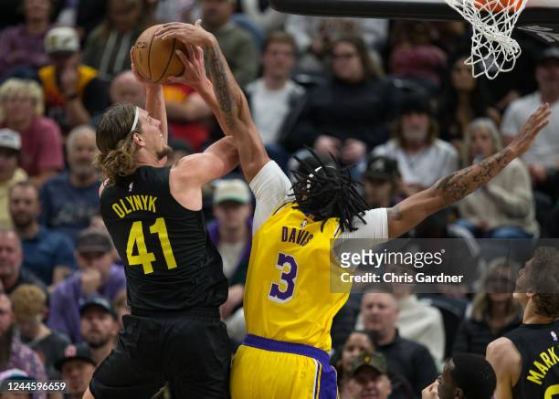 Anthony Davis of the Los Angeles Lakers blocks a shot by Kelly Olynyk of the Utah Jazz during the first half of the game at the Vivint Arena November...
