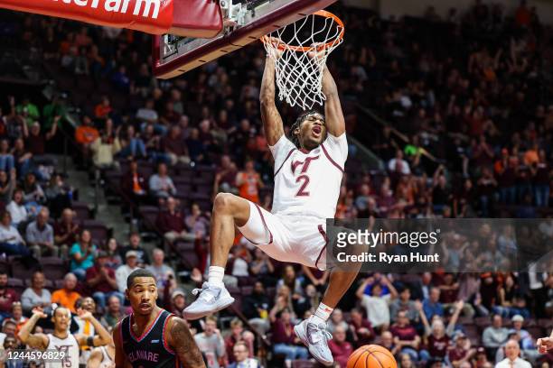 Guard Michael Collins Jr. #2 of the Virginia Tech Hokies dunks the ball against the Delaware State Hornets in the second half during the game at...