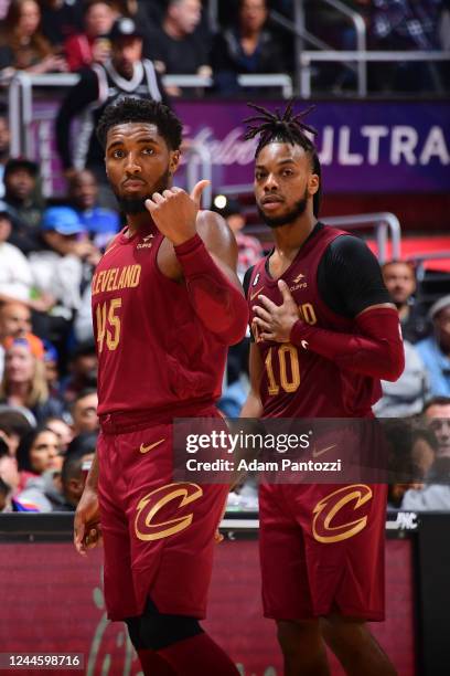 Donovan Mitchell and Darius Garland of the Cleveland Cavaliers look on against the LA Clippers on November 7, 2022 at Crypto.com Arena in Los...