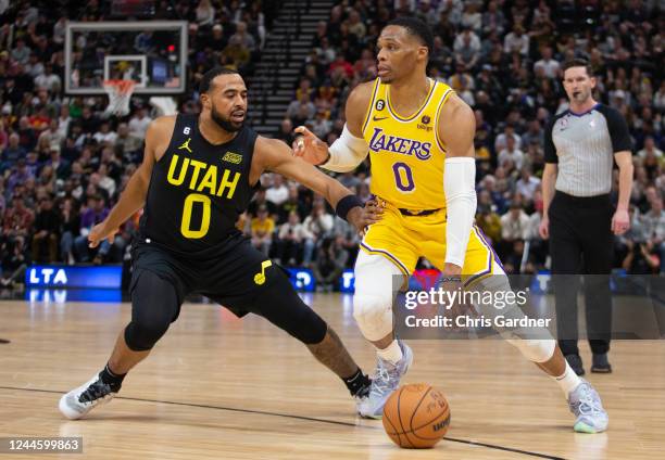 Russell Westbrook of the Los Angeles Lakers drives past Talen Horton-Tucker of the Utah Jazz during the first half of their game at the Vivint Arena...