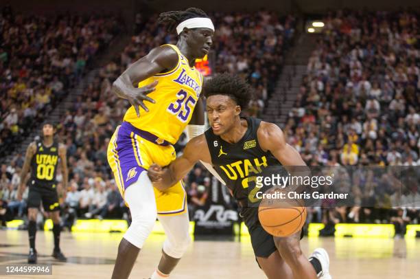 Collin Sexton of the Utah Jazz pushes past Wenyen Gabriel of the Los Angeles Lakers during the second half of their game at the Vivint Arena November...
