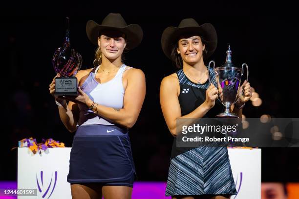 Runner-up Aryna Sabalenka of Belarus and champion Caroline Garcia of France pose with their trophies after their singles final match on Day 8 of the...