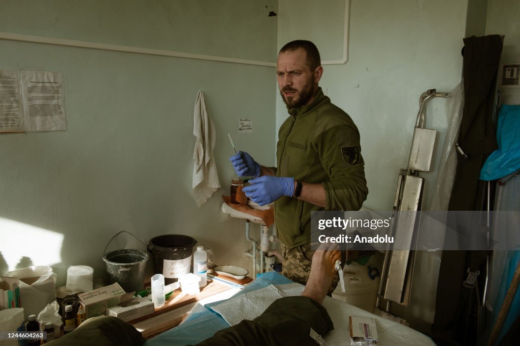 Stabilization Point Body A doctor treats a soldier at a medical stabilization point, located ...