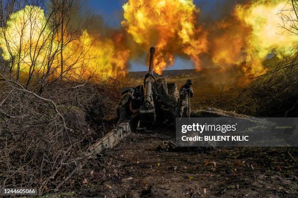 Ukrainian soldier of a artillery unit fires towards Russian positions outside Bakhmut on November 8 amid the Russian invasion of Ukraine.