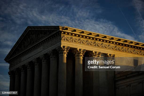 The rising sun creeps across the US Supreme Court on November 8, 2022 in Washington, DC. The Court is hearing a case today that challenges the...