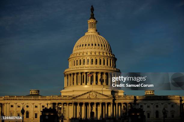 The rising sun strikes the US Capitol dome on November 8, 2022 in Washington, DC. After months of campaigning, Americans across the nation are...