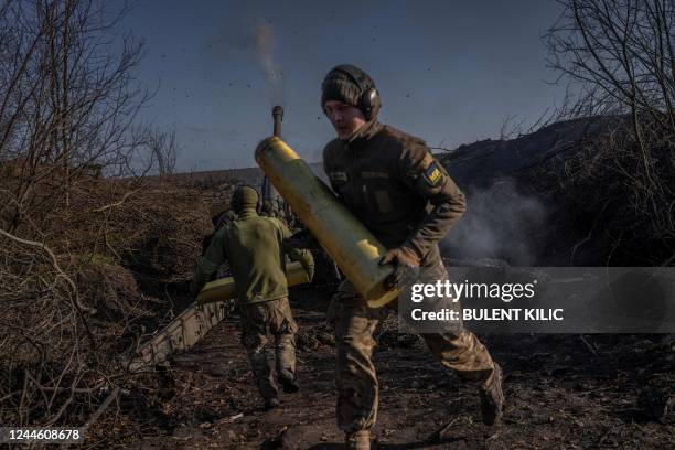 Ukrainian soldiers of an artillery unit fire towards Russian positions outside Bakhmut on November 8 amid the Russian invasion of Ukraine.