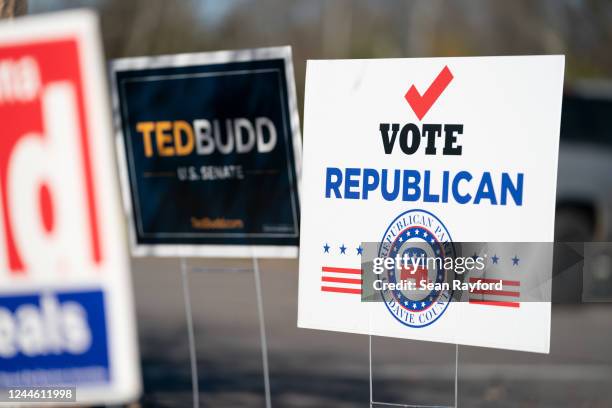 Signs for U.S. Republican Senate candidate Ted Budd and the Republican Party of Davie County outside a polling place at Farmington Baptist Church on...