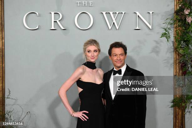 Australian actor Elizabeth Debicki and English actor Dominic West pose on the red carpet upon arrival to attend the World Premiere of "The Crown " in...