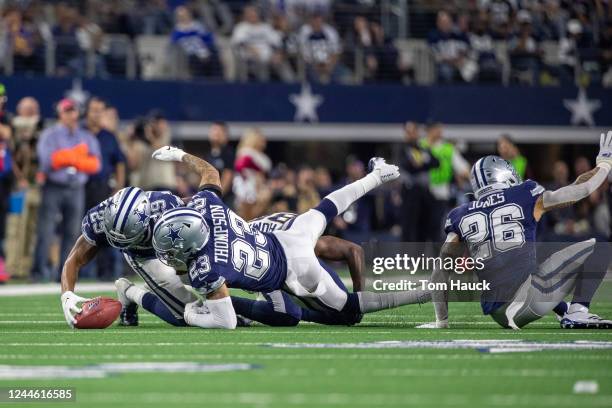 Dallas Cowboys defensive back C.J. Goodwin and Dallas Cowboys defensive back Darian Thompson recover a fumble during an NFL regular season football...