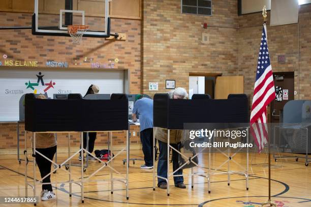People vote on election day on November 8, 2022 in Grand Rapids, Michigan. After months of candidates campaigning, Americans are voting in the...